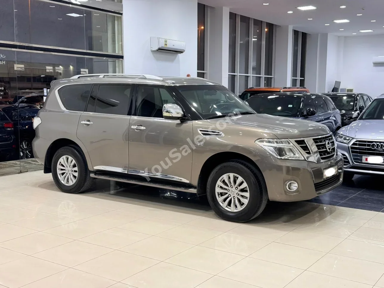 Nissan  Patrol  XE  2016  Automatic  259,750 KM  8 Cylinder  SUV  Brown