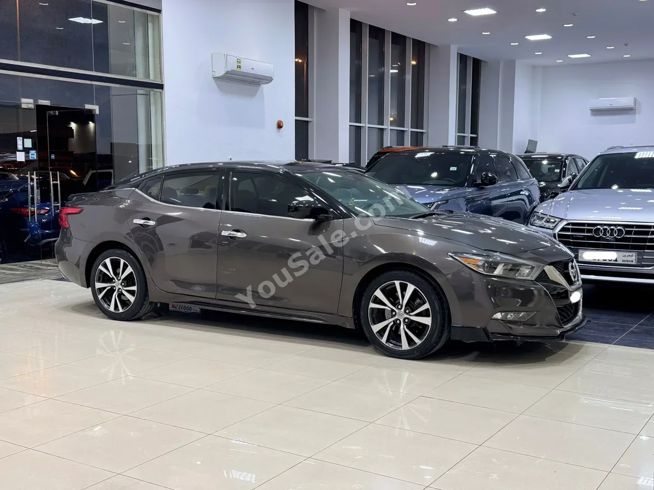 Nissan  Maxima  2016  Automatic  107,700 KM  6 Cylinder  Sedan  Brown