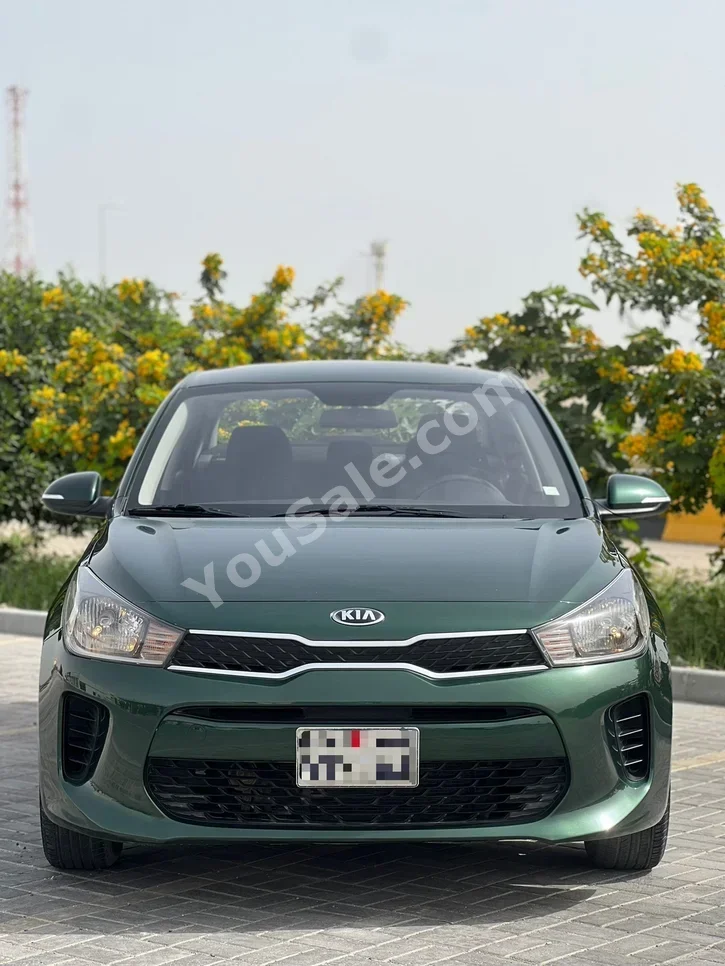 Kia Rio 2018 Automatic 128,000 KM 4 Cylinder Sedan Dark Green