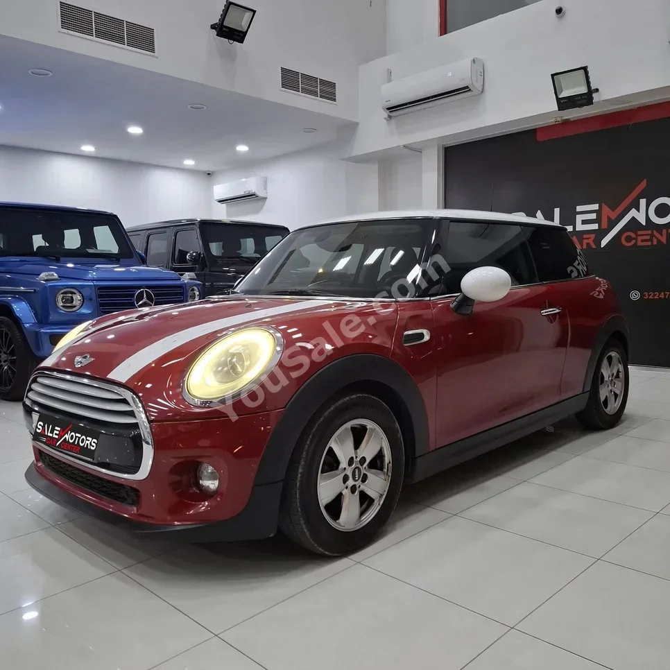 Mini  Cooper  Coupe  2015  Automatic  115,500 KM  3 Cylinder  Coupe / Sport  Red