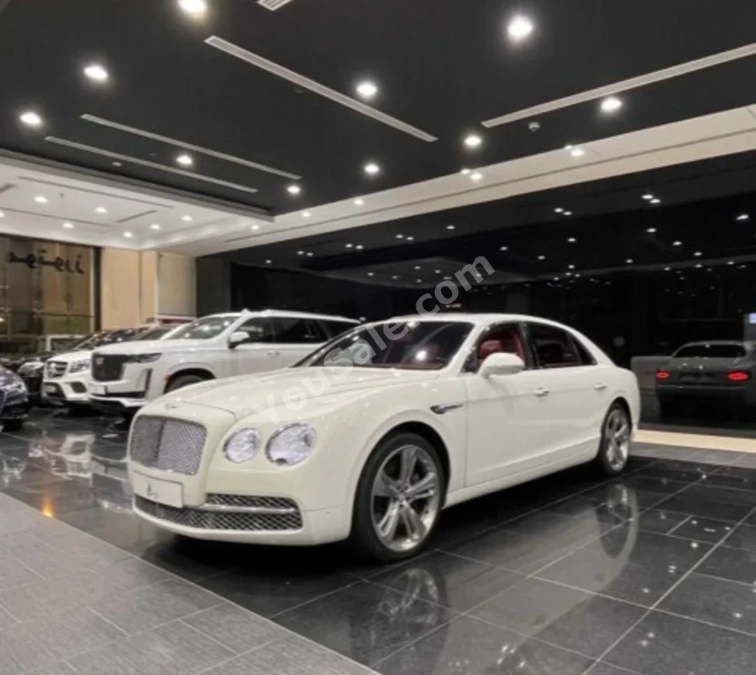 Bentley  Flying Springs  2014  Automatic  125,000 KM  12 Cylinder  Sedan  White