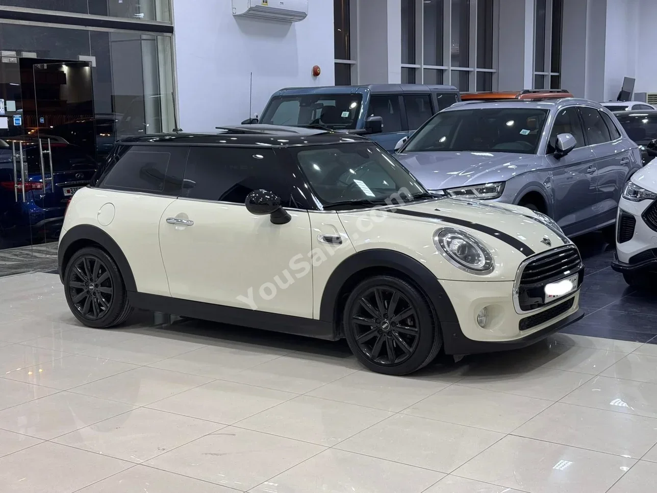 Mini  Cooper  2019  Automatic  63,150 KM  3 Cylinder  Hatchback  White