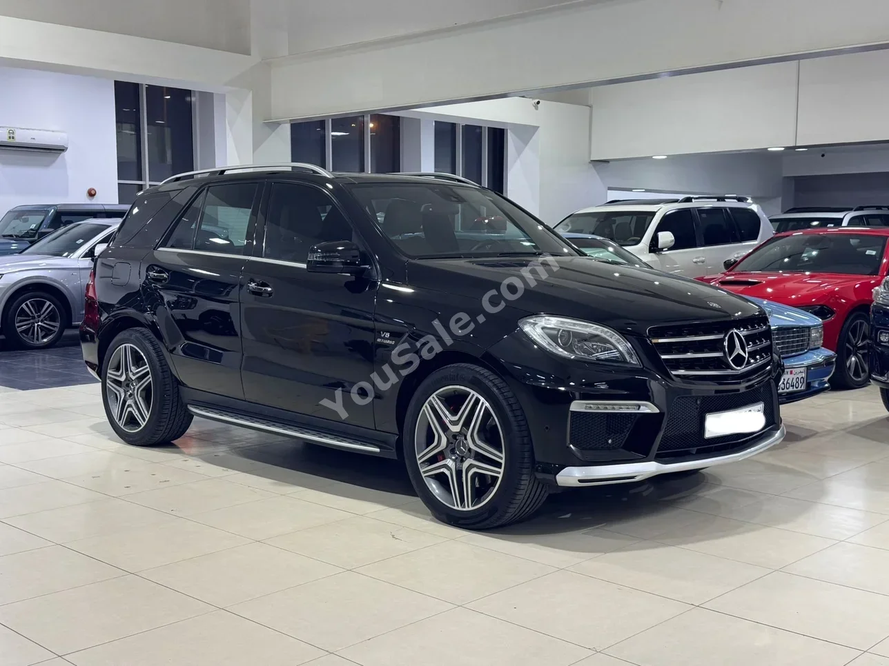 مرسيدس - بنز  ام ال - كلاس  63 AMG  2013  اتوماتك  166,150 كم  8 سلندر  اس يو في  أسود