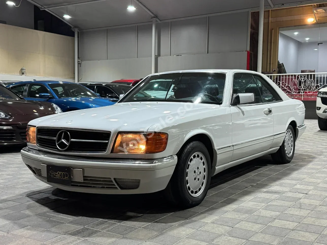 مرسيدس - بنز  560 SEC  1998  اتوماتك  153,000 كم  8 سلندر  سيدان  أبيض