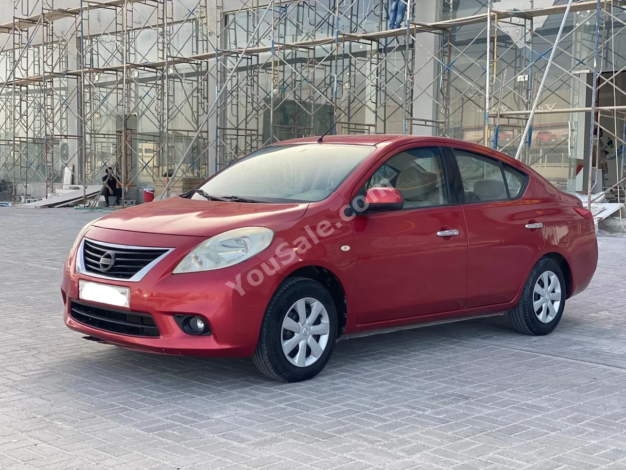 Nissan  Sunny  2014  Automatic  171,300 KM  4 Cylinder  Sedan  Red