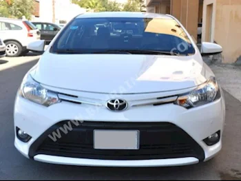 Toyota  Yaris  2014  Sedan  Automatic  4  78,000  RWD  White  Gasoline