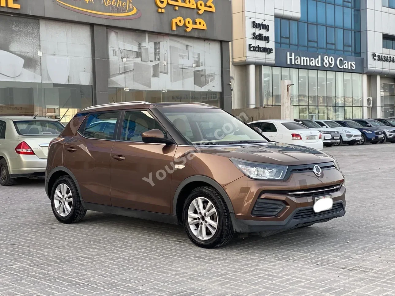 SSangyong  Tivoli  2018  Automatic  93,000 KM  4 Cylinder  SUV  Brown
