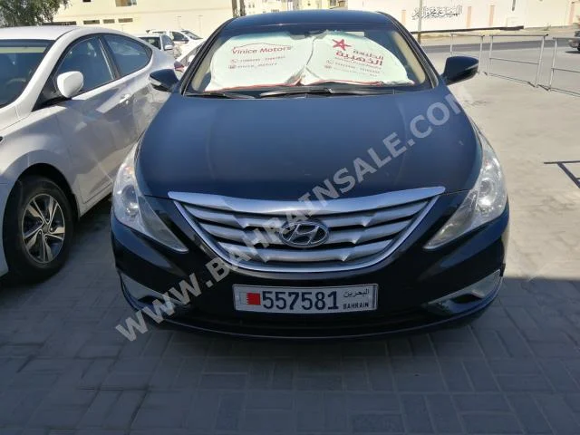 Hyundai  Sonata  2014  Sedan  Automatic  4  60,000  FWD  Black  Gasoline