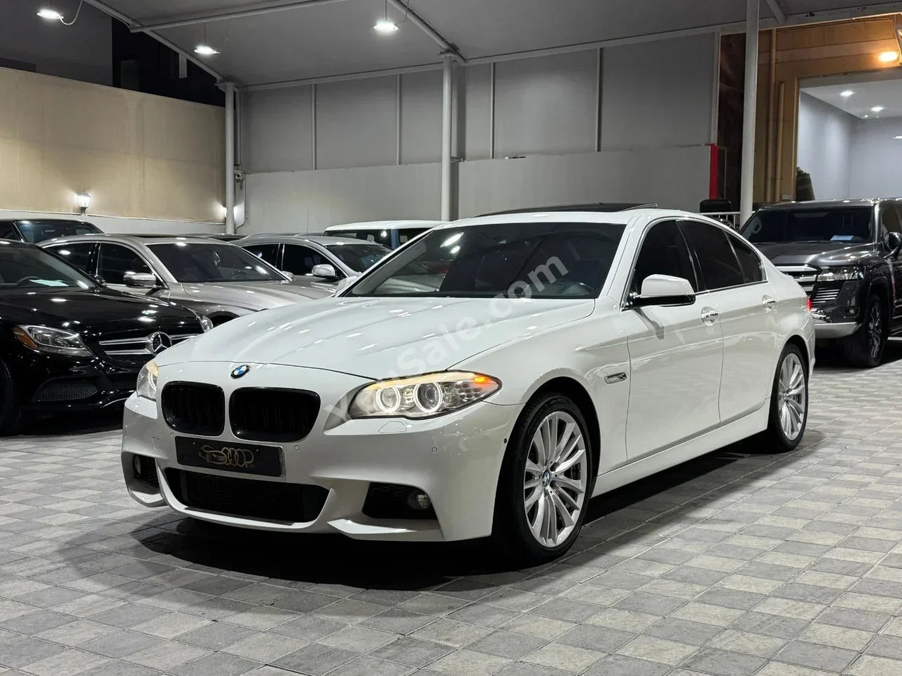 BMW  5-Series  550i  2011  Automatic  137,000 KM  8 Cylinder  Sedan  White