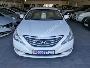 Hyundai  Sonata  2014  Sedan  Automatic  4  67,000  FWD  White  Gasoline