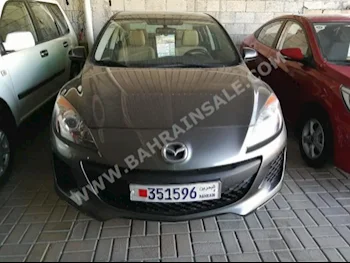 Mazda  Mazda 3  2014  Sedan  Automatic  4  51,000  FWD  Gray  Gasoline
