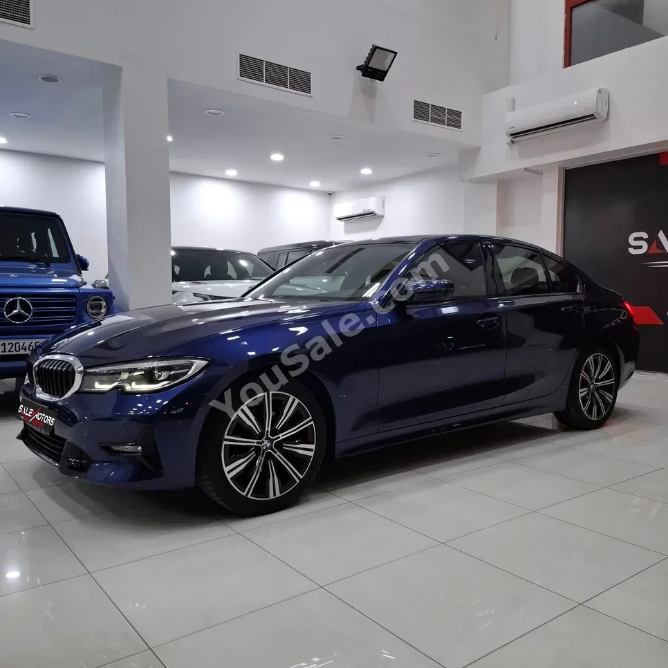 BMW  3-Series  320i  2021  Automatic  96,300 KM  3 Cylinder  Sedan  Blue