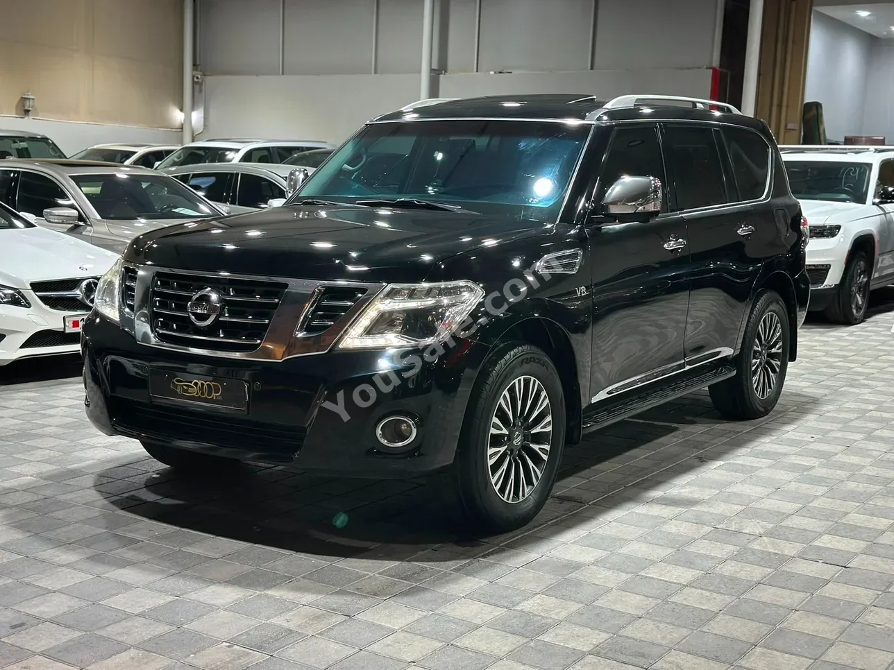 Nissan Patrol Platinum 2014 Automatic 276,000 KM 8 Cylinder SUV Black