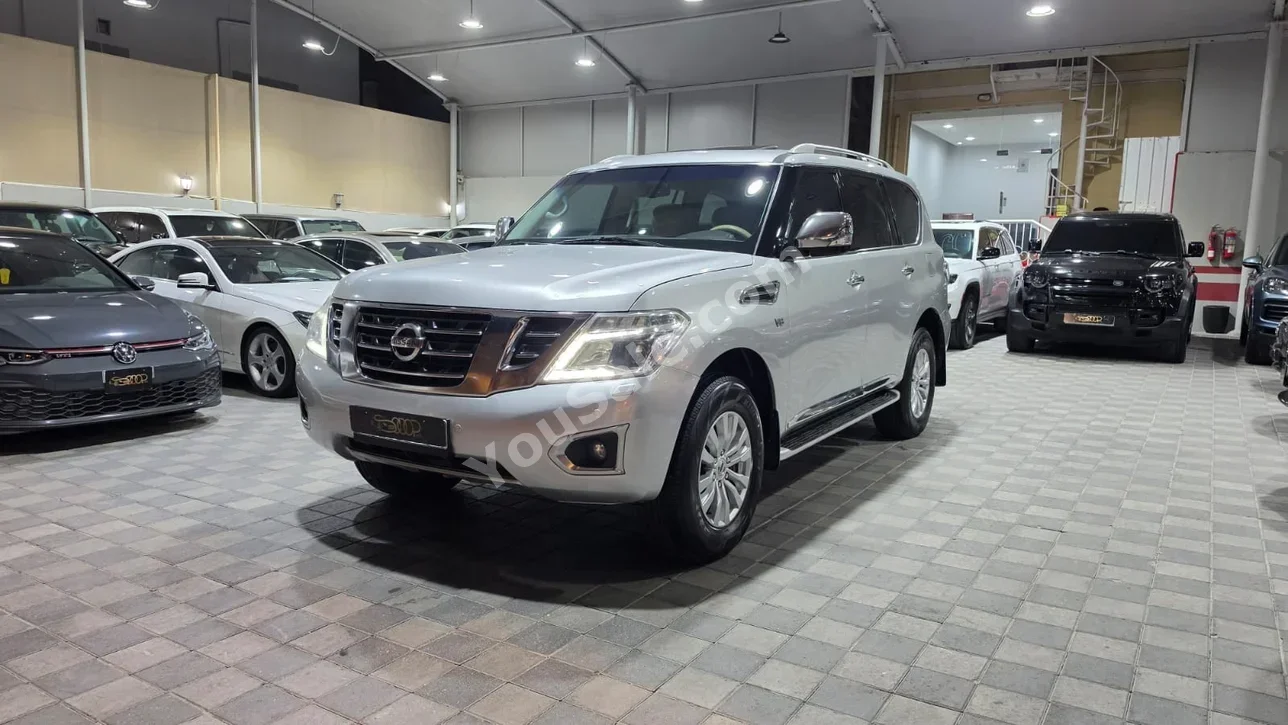 Nissan  Patrol  SE  2014  Automatic  246,000 KM  8 Cylinder  SUV  Silver