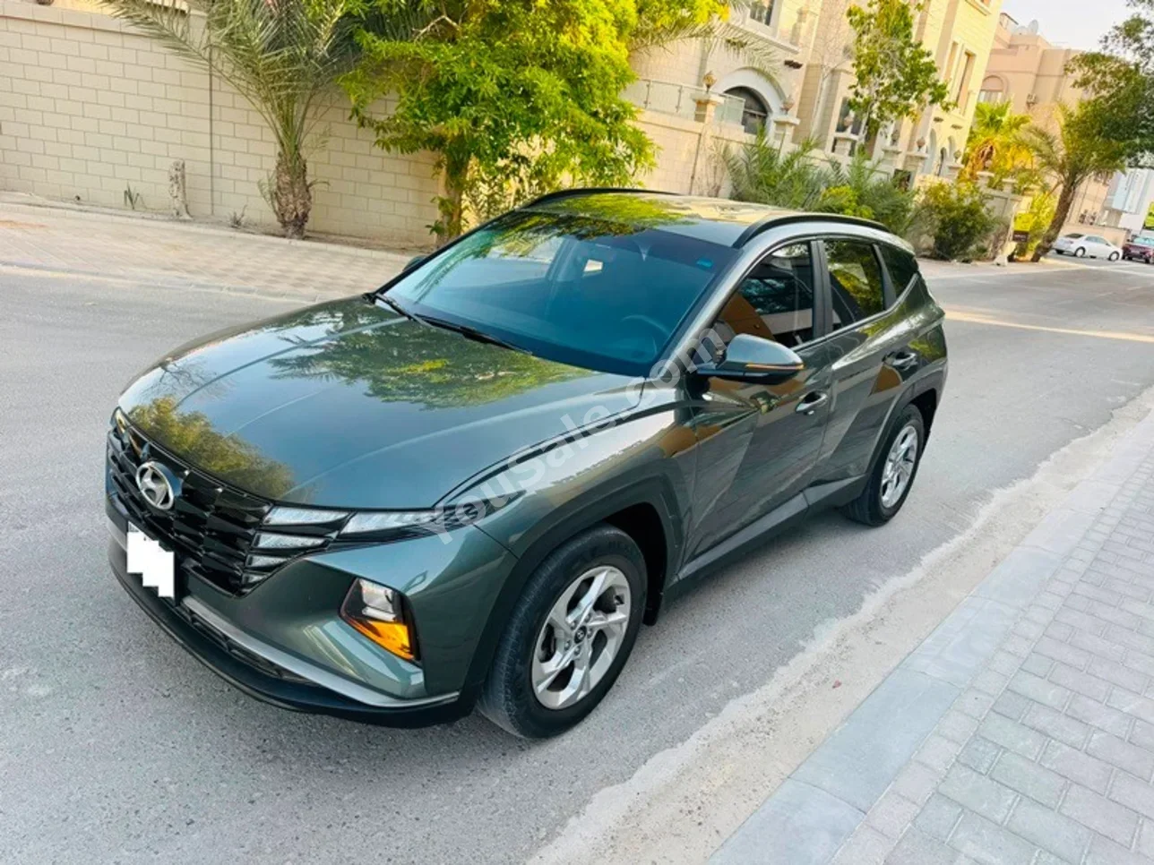 Hyundai  Tucson  2022  Automatic  63,000 KM  4 Cylinder  SUV  Gray