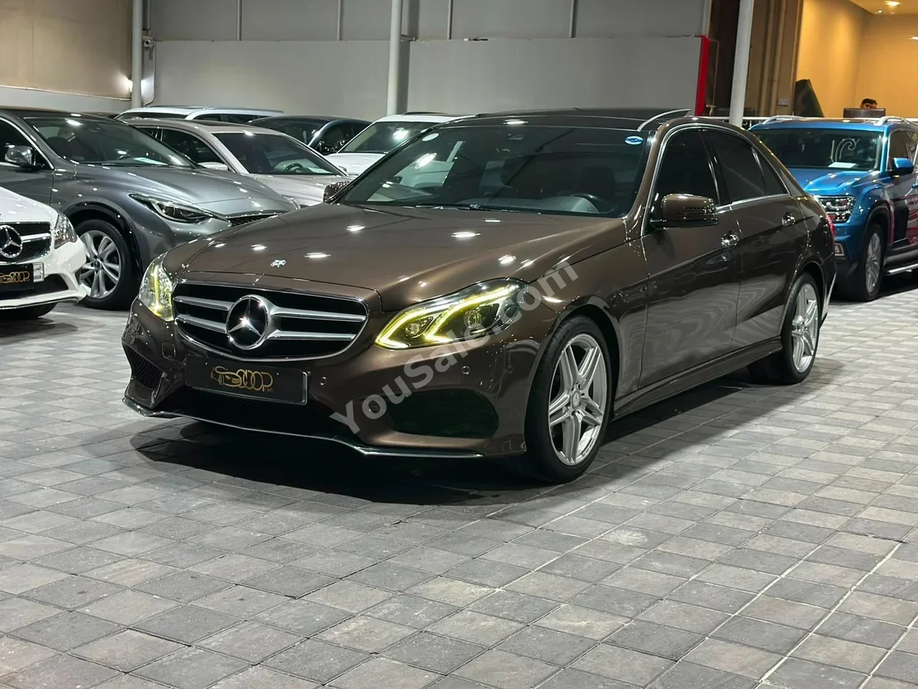 مرسيدس - بنز اي - كلاس 300 AMG 2014 اتوماتك 148,000 كم 6 سلندر سيدان بني