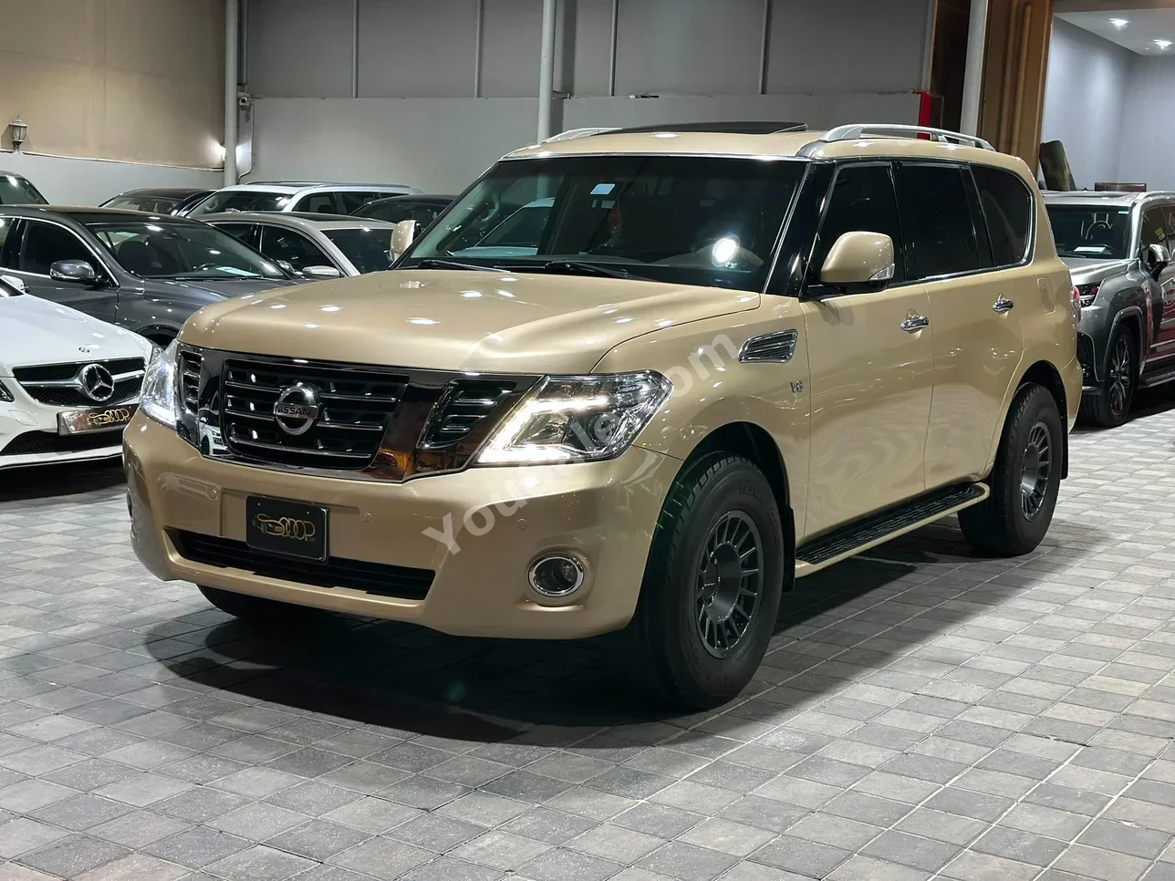 نيسان باترول ال اي 2013 اتوماتك 274,000 كم 8 سلندر اس يو في ذهبي