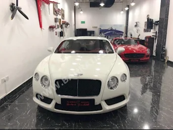Bentley  GT  Speed  2014  Coupe / Sport  Automatic  12  32,000  RWD  White  Gasoline