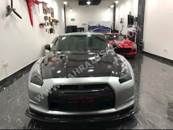 Nissan  GT-R  35  2009  Coupe / Sport  Automatic  6  10,000  RWD  Silver  Gasoline