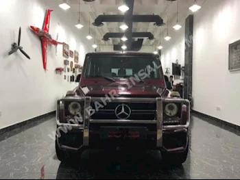 Mercedes-Benz  G-Class  63 AMG  2013  SUV  Automatic  8  94,000  4WD  Maroon  Gasoline