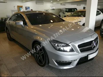 Mercedes-Benz  CLS-Class  63 AMG  2013  Sedan  Automatic  8  89,000  RWD  Gold  Gasoline