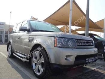 Land Rover  Range Rover  Sport Super charged  2011  SUV  Automatic  8  210,000  4WD  Gray  Gasoline