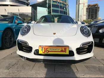 بورش  911  توربو اس  2014  كوبيه \ سبورت  اتوماتك  6  100,000  دفع خلفي  أبيض  بنزين