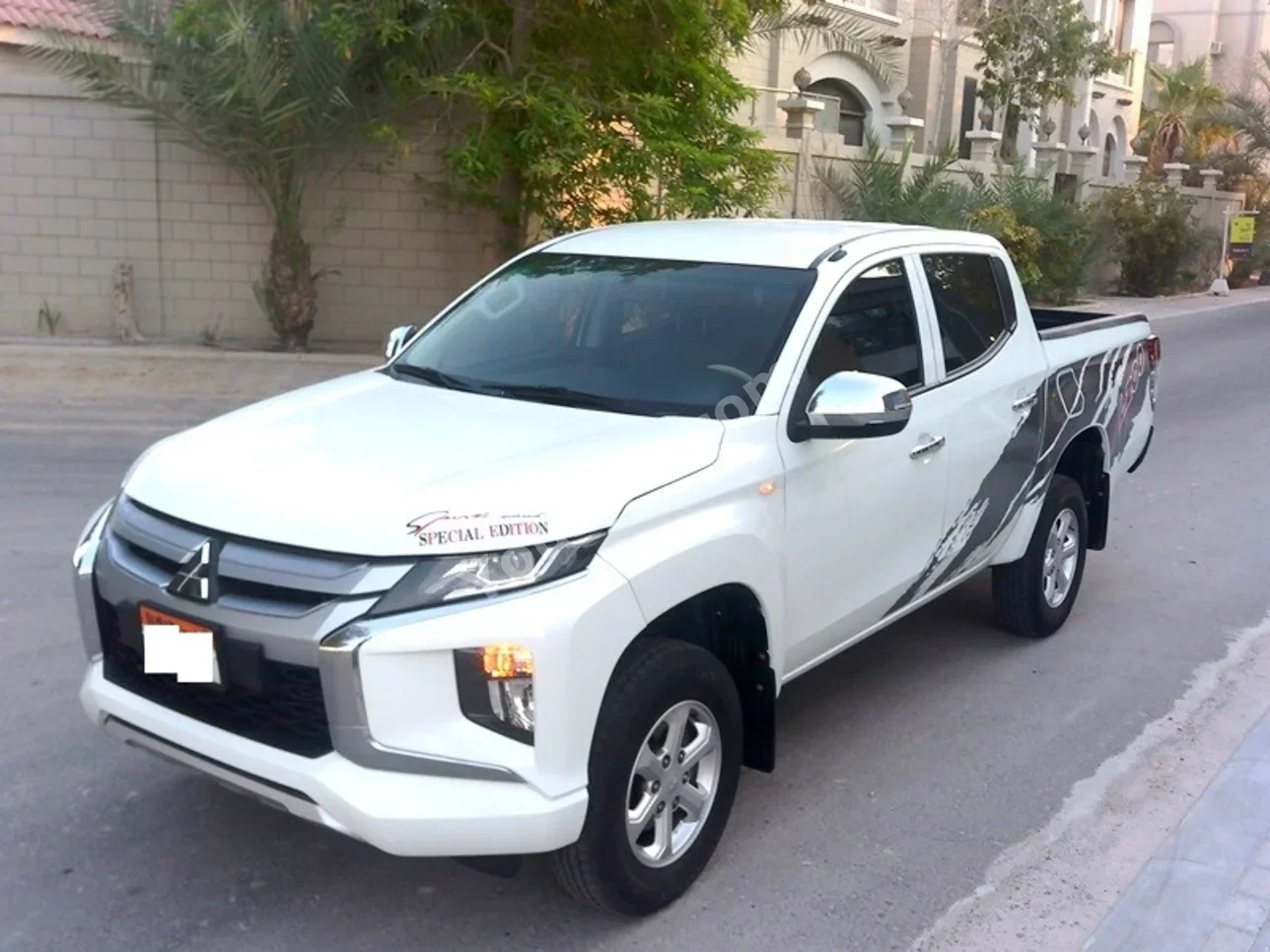 Mitsubishi  Pickup  2022  Manual  110,000 KM  4 Cylinder  Pick Up  White