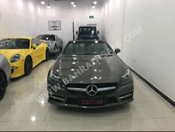 Mercedes-Benz  SLK-Class  200  2012  Coupe / Sport  Automatic  4  100,000  RWD  Brown  Gasoline