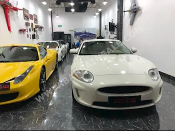 Jaguar  XK  2010  Coupe / Sport  Automatic  6  140,000  RWD  White  Gasoline