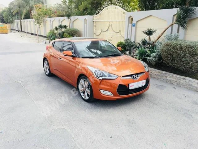 Hyundai  Veloster  2014  Hatchback  Automatic  4  45,000  AWD  Orange  Gasoline