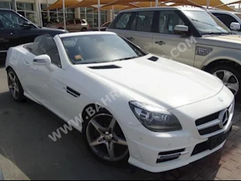 Mercedes-Benz  SLK-Class  200  2015  Convertible  Automatic  4  83,000  RWD  White  Gasoline