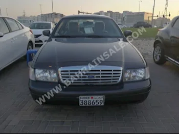 Ford  Crown Victoria  2011  Sedan  Automatic  8  156,000  RWD  Brown  Gasoline