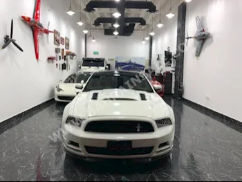 Ford  Mustang  GT  2013  Coupe / Sport  Automatic  8  124,000  RWD  White  Gasoline