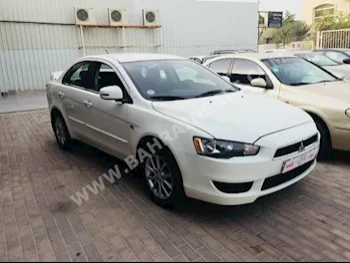 Mitsubishi  Lancer  EX  2015  Sedan  Automatic  4  75,000  AWD  White  Gasoline
