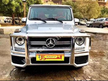 مرسيدس - بنز  جي - كلاس  55 AMG  2012  اس يو في  اتوماتك  8  112,000  دفع رباعي  فضي  بنزين