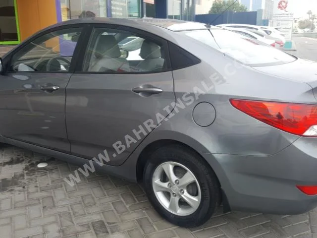 Hyundai  Accent  1.6  2014  Sedan  Automatic  4  48,000  FWD  Gray  Gasoline