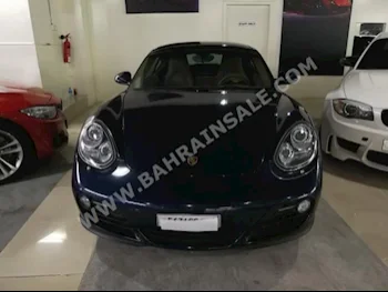 Porsche  Cayman  S  2010  Coupe / Sport  Automatic  6  115,000  RWD  Blue  Gasoline