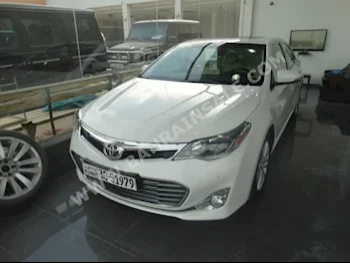 Toyota  Avalon  Limited  2014  Sedan  Automatic  6  14,000  RWD  White  Gasoline