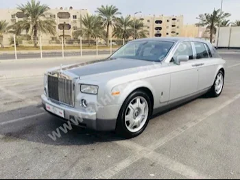 Rolls-Royce  Phantom  2004  Sedan  Automatic  12  39,000  RWD  Silver  Gasoline