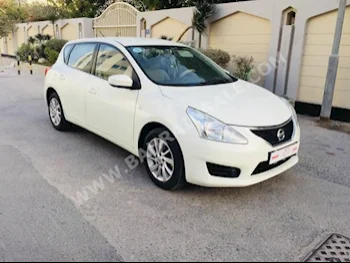 Nissan  Tiida  2014  Hatchback  Automatic  4  45,000  AWD  White  Gasoline