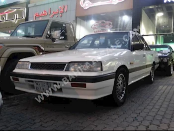 نيسان  سكايلاين  1989  سيدان  عادي  6  0  دفع خلفي  أبيض  بنزين