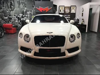 Bentley  GT  2014  Coupe / Sport  Automatic  8  50,000  RWD  White  Gasoline