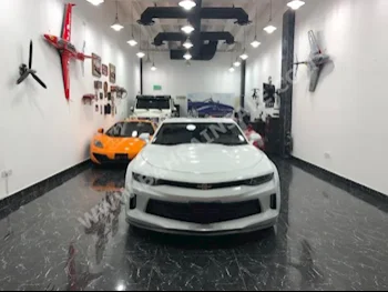 Chevrolet  Camaro  RS  2016  Coupe / Sport  Automatic  6  69,000  RWD  White  Gasoline
