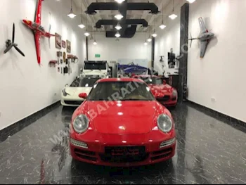 Porsche  911  Carrera  2007  Coupe / Sport  Automatic  8  93,000  RWD  Red  Gasoline
