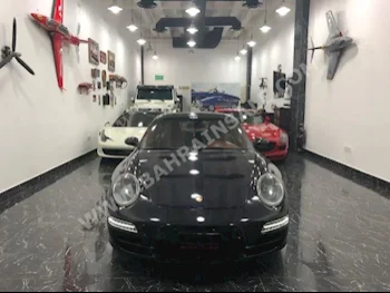 Porsche  911  Carrera  2007  Coupe / Sport  Automatic  8  132,000  RWD  Black  Gasoline