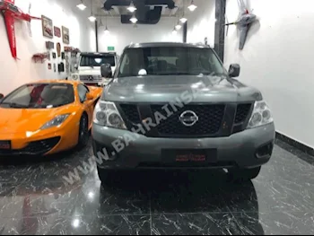 Nissan  Patrol  SE  2015  SUV  Manual  8  70,000  4WD  Silver  Gasoline