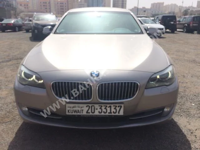 BMW  5-Series  520i  2013  Sedan  Automatic  4  86,000  RWD  Gold  Gasoline