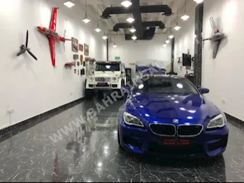 BMW  M-Series  6  2016  Coupe / Sport  Automatic  6  30,000  RWD  Blue  Gasoline