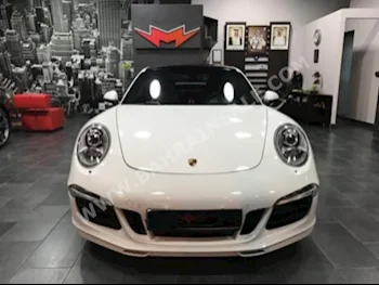 Porsche  911  Carrera  2015  Coupe / Sport  Automatic  6  22,000  RWD  White  Gasoline